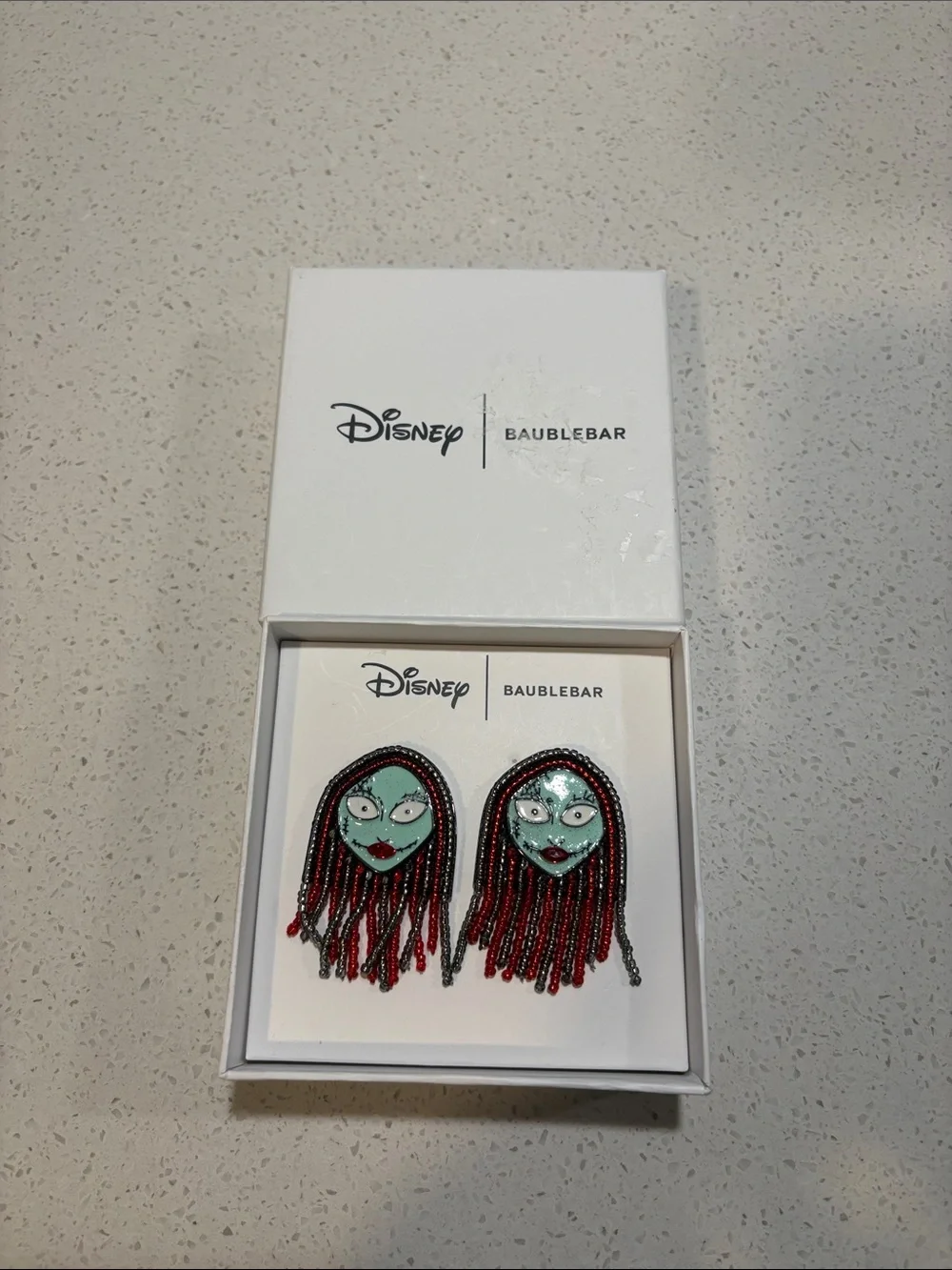 BaubleBar Disney Nightmare Sally Enamel Face Fringe Earrings - Red and Teal